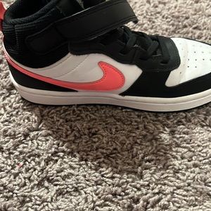 Really cute hightop black and pink Nikes